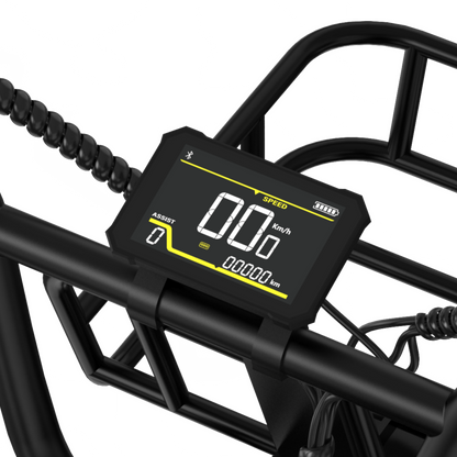 Digital speedometer on a black bike frame with visible brand logo.